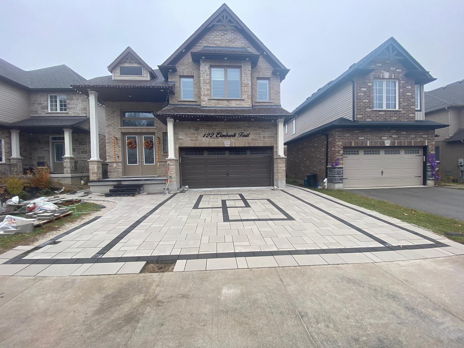 Finished driveway with paver border